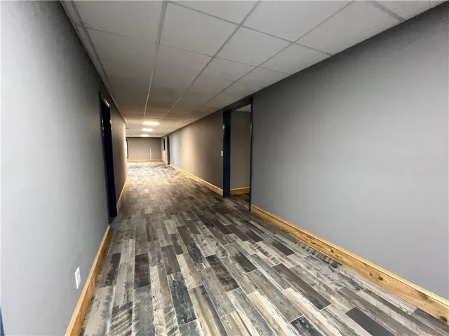 a view of an empty room with closet area