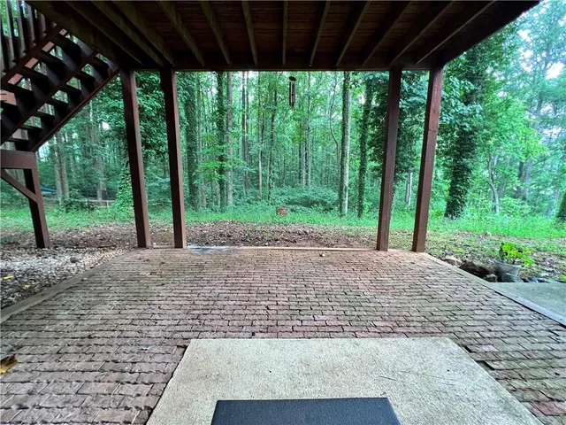 a room with a dresser and a mirror