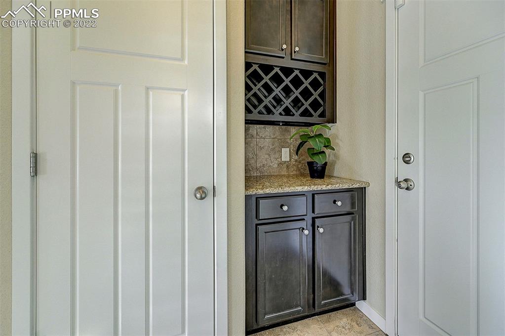 6750 Alliance Loop Colorado Springs, CO 80925 - Photo 11 of 32 a view of cabinets and utility room