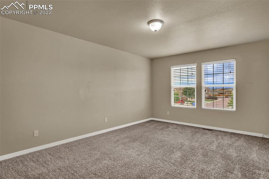 6750 Alliance Loop Colorado Springs, CO 80925 - Photo 18 of 32 an empty room with a window