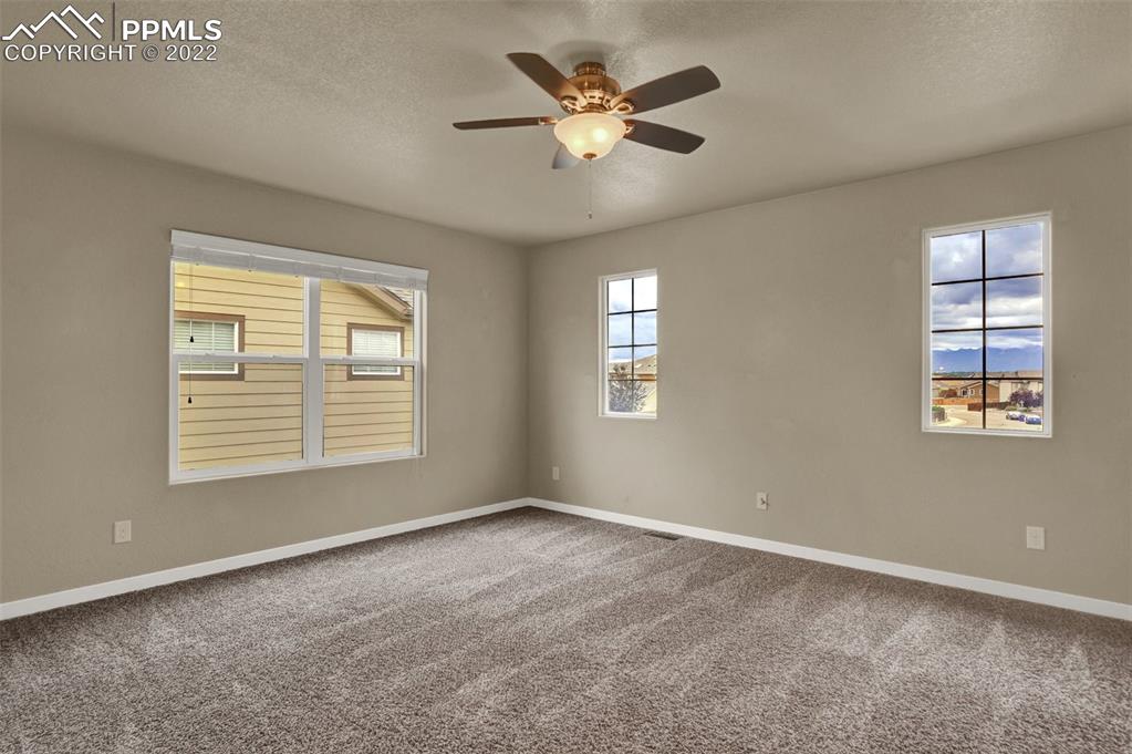 6750 Alliance Loop Colorado Springs, CO 80925 - Photo 20 of 32 a view of an empty room with a window