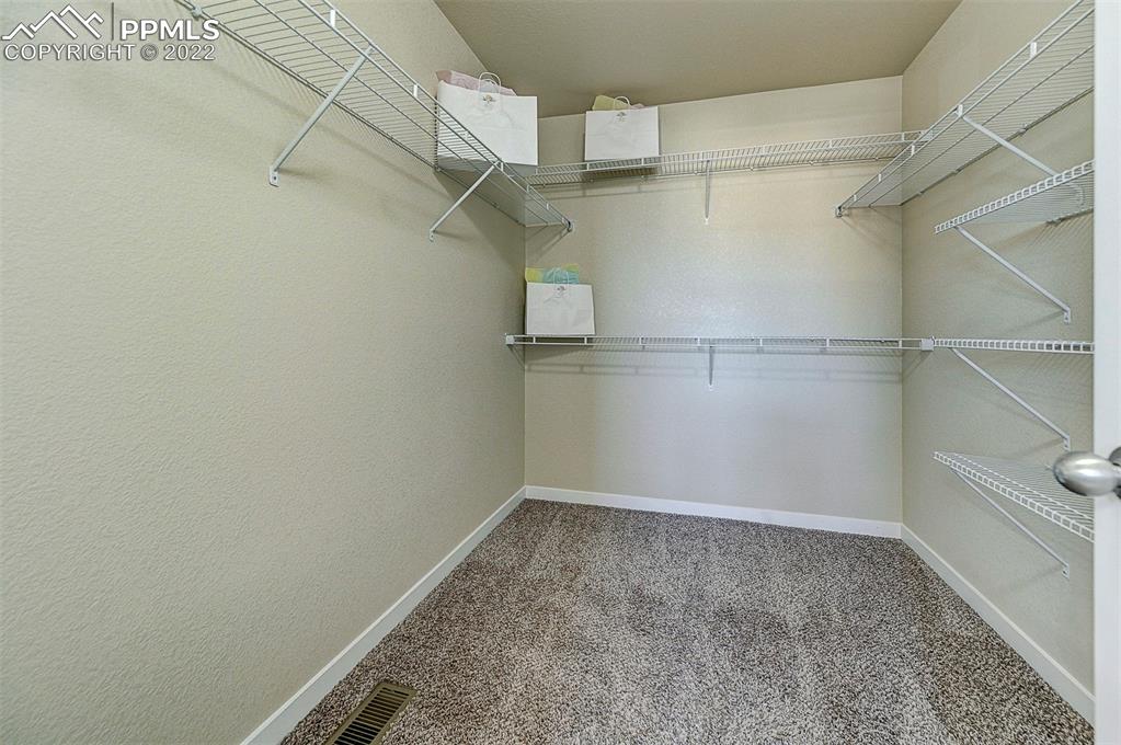 6750 Alliance Loop Colorado Springs, CO 80925 - Photo 22 of 32 a view of a room with racks on the wall