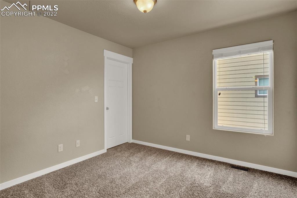 6750 Alliance Loop Colorado Springs, CO 80925 - Photo 23 of 32 an empty room with a window