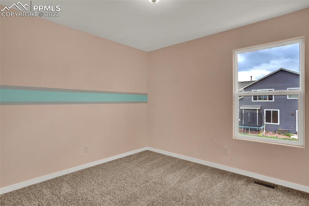 6750 Alliance Loop Colorado Springs, CO 80925 - Photo 25 of 32 an empty room with a window