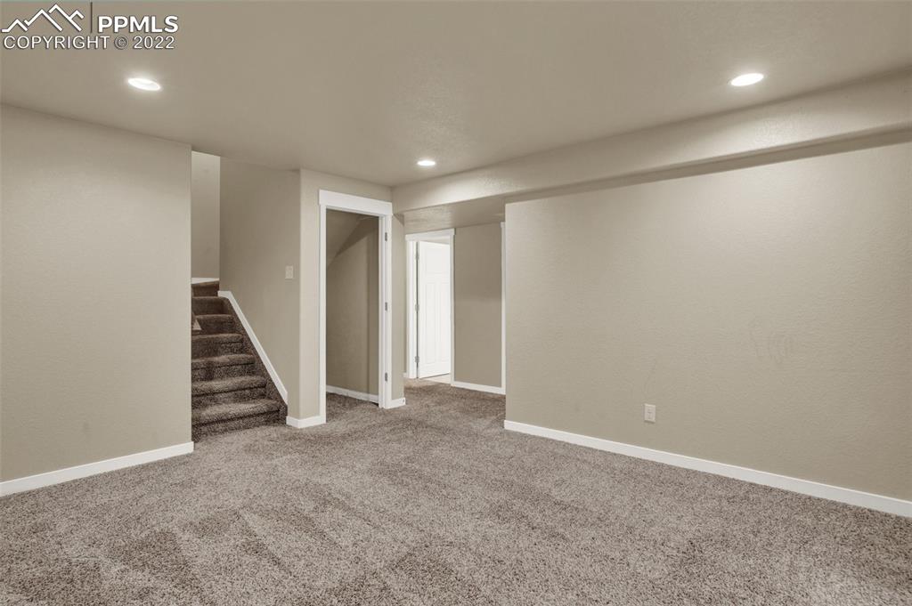 6750 Alliance Loop Colorado Springs, CO 80925 - Photo 27 of 32 en view of an empty room with stairs