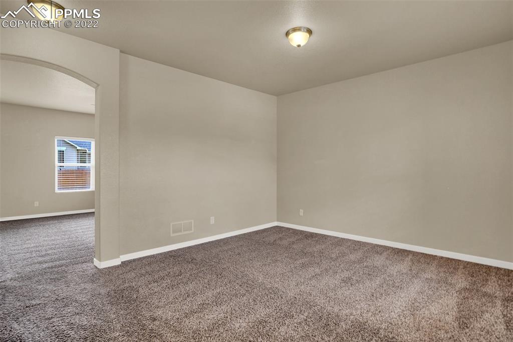6750 Alliance Loop Colorado Springs, CO 80925 - Photo 6 of 32 an empty room with windows