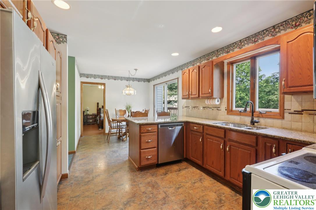 1705 Deer Path Road Easton, PA 18040 - Photo 14 of 42 a large kitchen with a large window and refrigerator