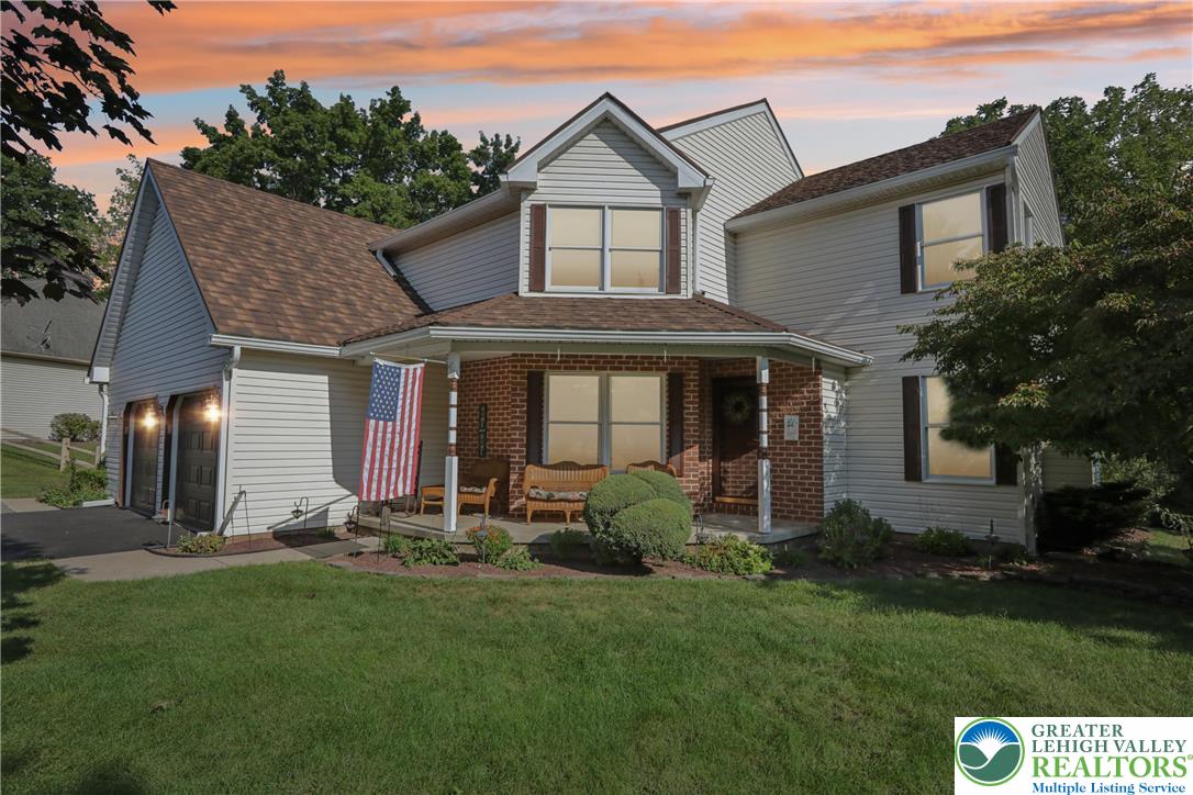 1705 Deer Path Road Easton, PA 18040 - Photo 3 of 42 a front view of a house with a yard and garage
