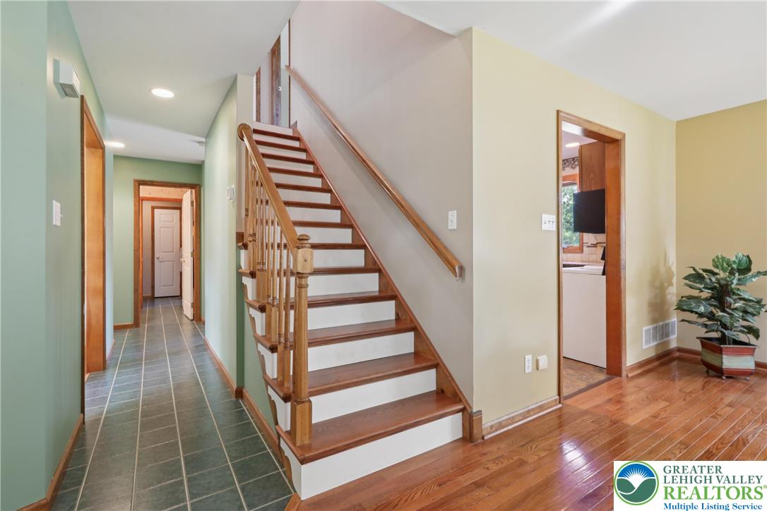 1705 Deer Path Road Easton, PA 18040 - Photo 6 of 42 a view of entryway with wooden floor and stairs