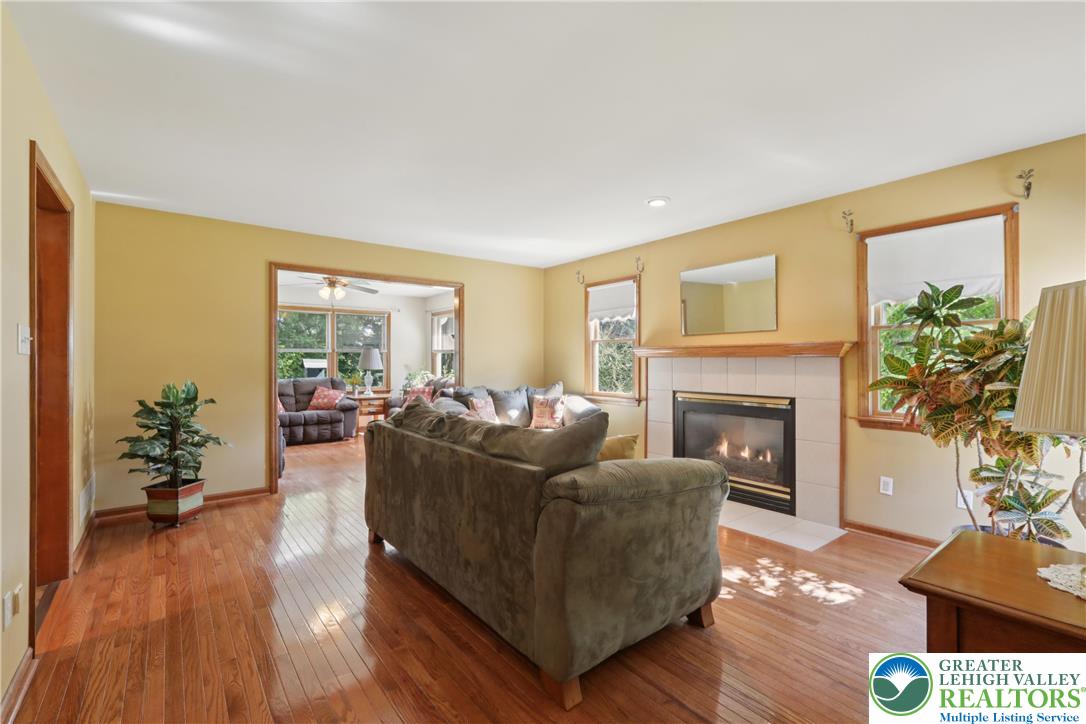 1705 Deer Path Road Easton, PA 18040 - Photo 7 of 42 a living room with furniture and a fireplace