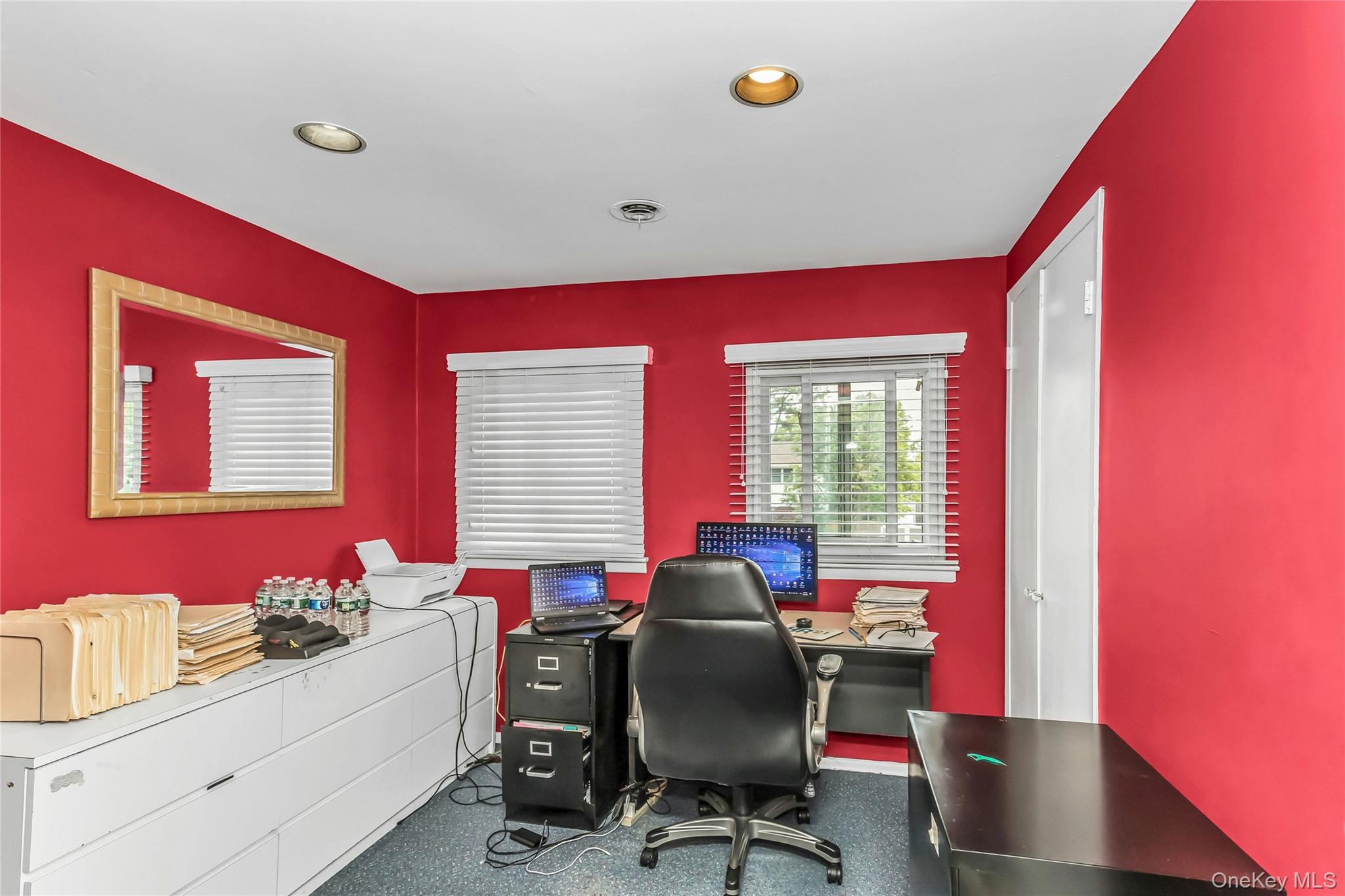 57 Joyce Road Plainview, NY 11803 - Photo 15 of 20 a view of a workspace with furniture and a window