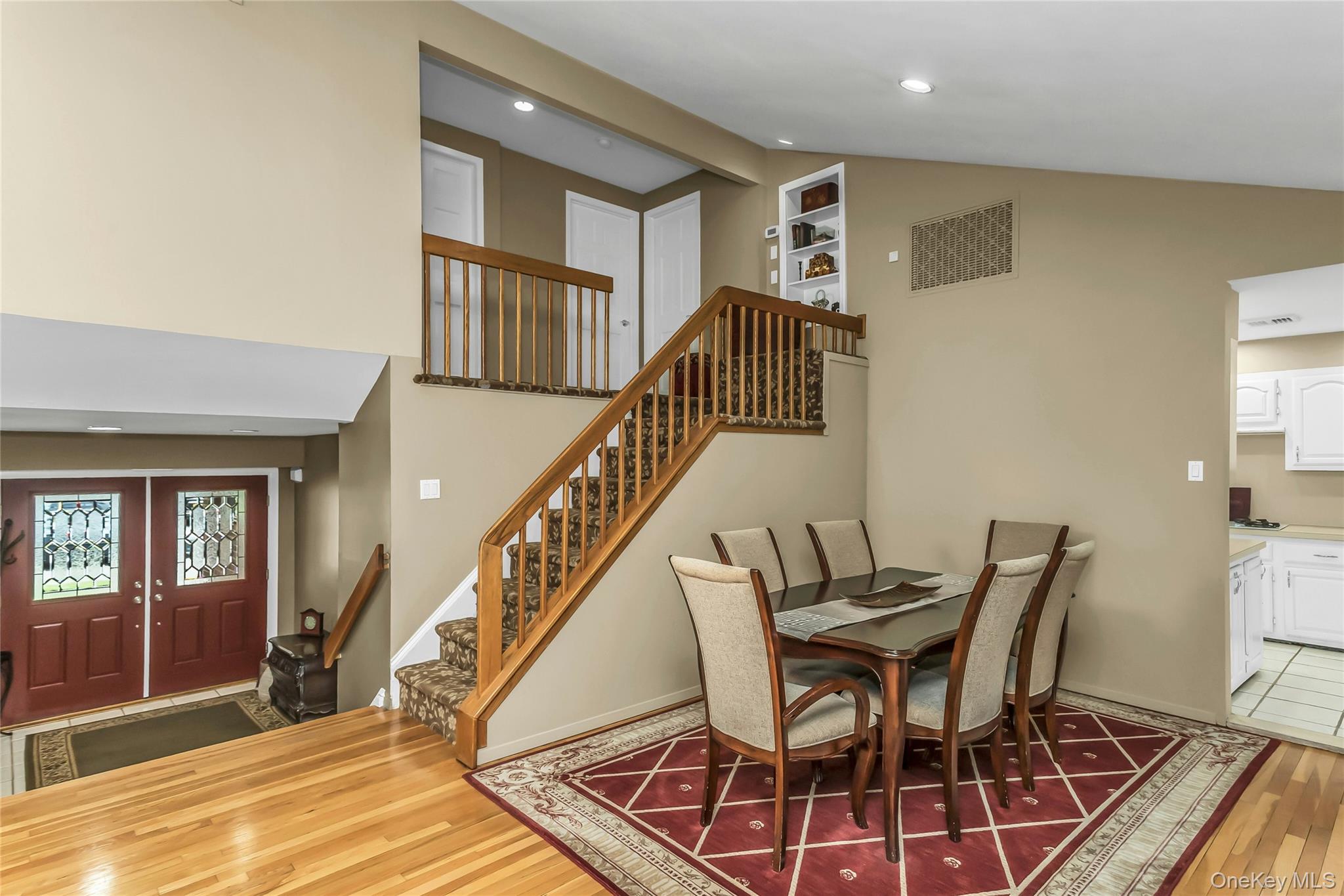 57 Joyce Road Plainview, NY 11803 - Photo 8 of 20 a view of a livingroom with furniture and staircase