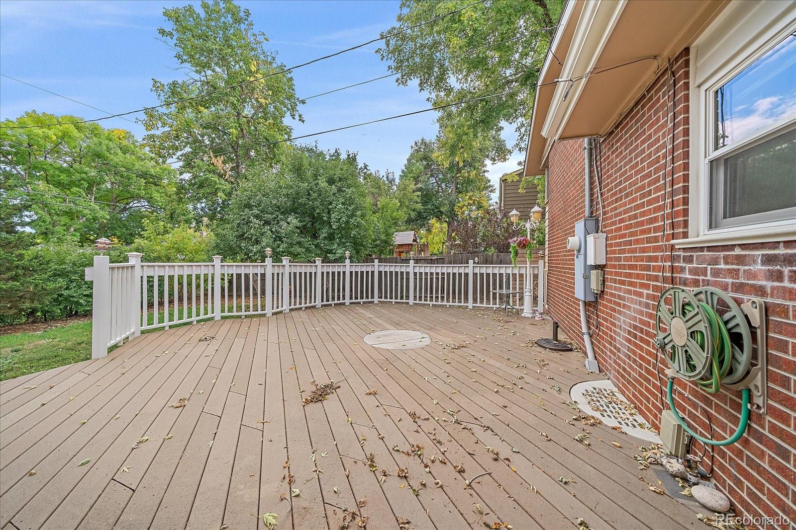 6072 Pierson Court Arvada, CO 80004 - Photo 29 of 31 a view of a wooden deck