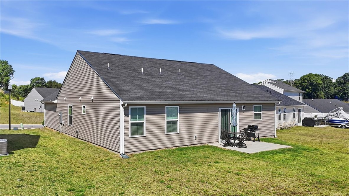 117 Alice Court Easley, SC 29642 - Photo 21 of 26 A private back patio extends from this comfortable home, offering an ideal spot for outdoor relaxation.