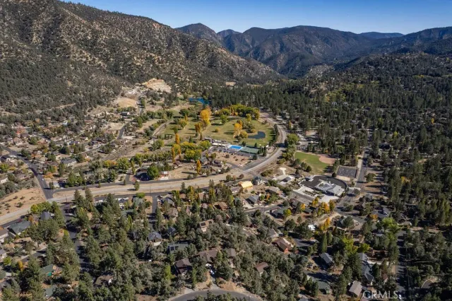 view of a mountain range in a field