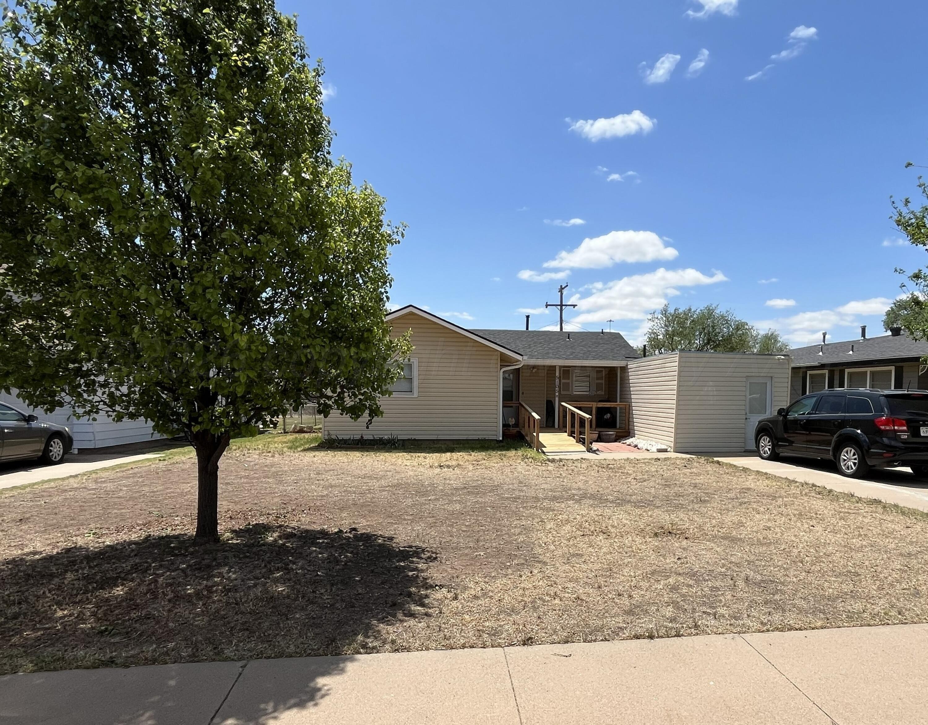 5105 James Avenue Amarillo, TX 79106 - Photo 1 of 21 a view of a house with a snow and yard