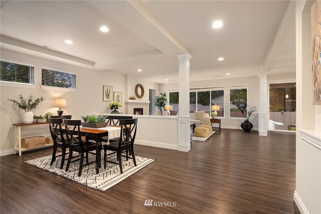 307 221st Place Southwest Bothell, WA 98021 - Photo 2 of 29 a view of a dining room with furniture and wooden floor