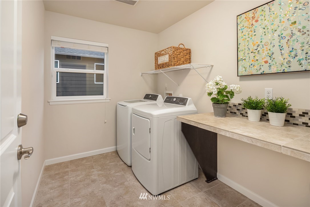 307 221st Place Southwest Bothell, WA 98021 - Photo 26 of 29 a utility room with a washer and dryer