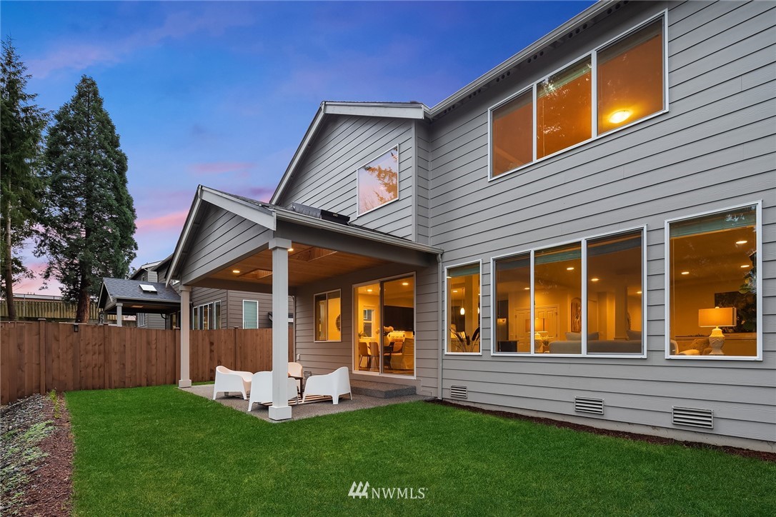 307 221st Place Southwest Bothell, WA 98021 - Photo 27 of 29 a view of a house with a yard and sitting area