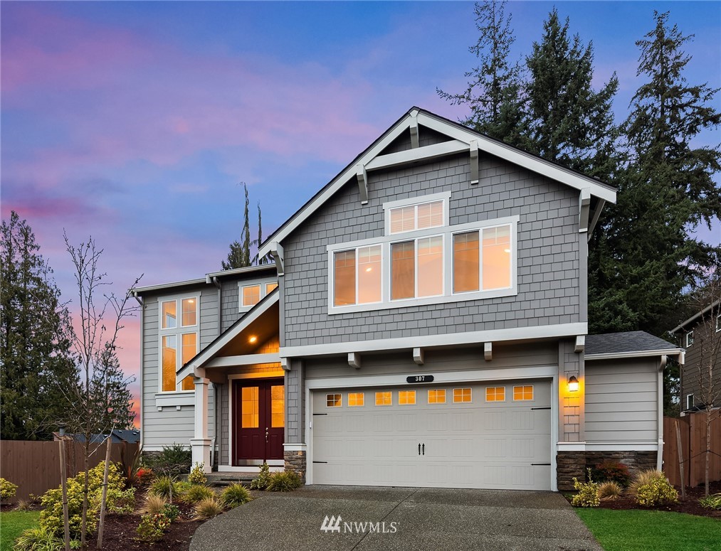307 221st Place Southwest Bothell, WA 98021 - Photo 28 of 29 a front view of a house with garden