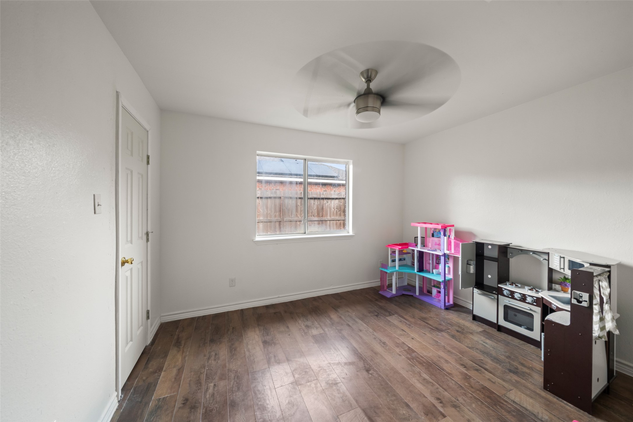 25434 Cedar Lane Splendora, TX 77372 - Photo 18 of 29 a view of a workspace with furniture and wooden floor