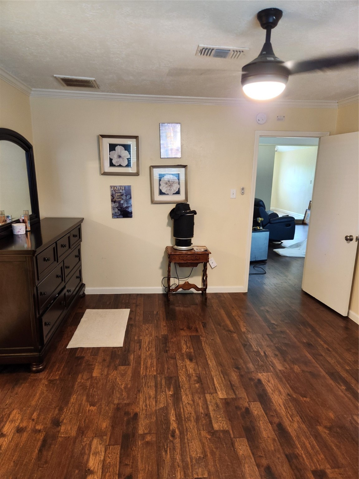 25434 Cedar Lane Splendora, TX 77372 - Photo 24 of 29 a living room with furniture and a wooden floor