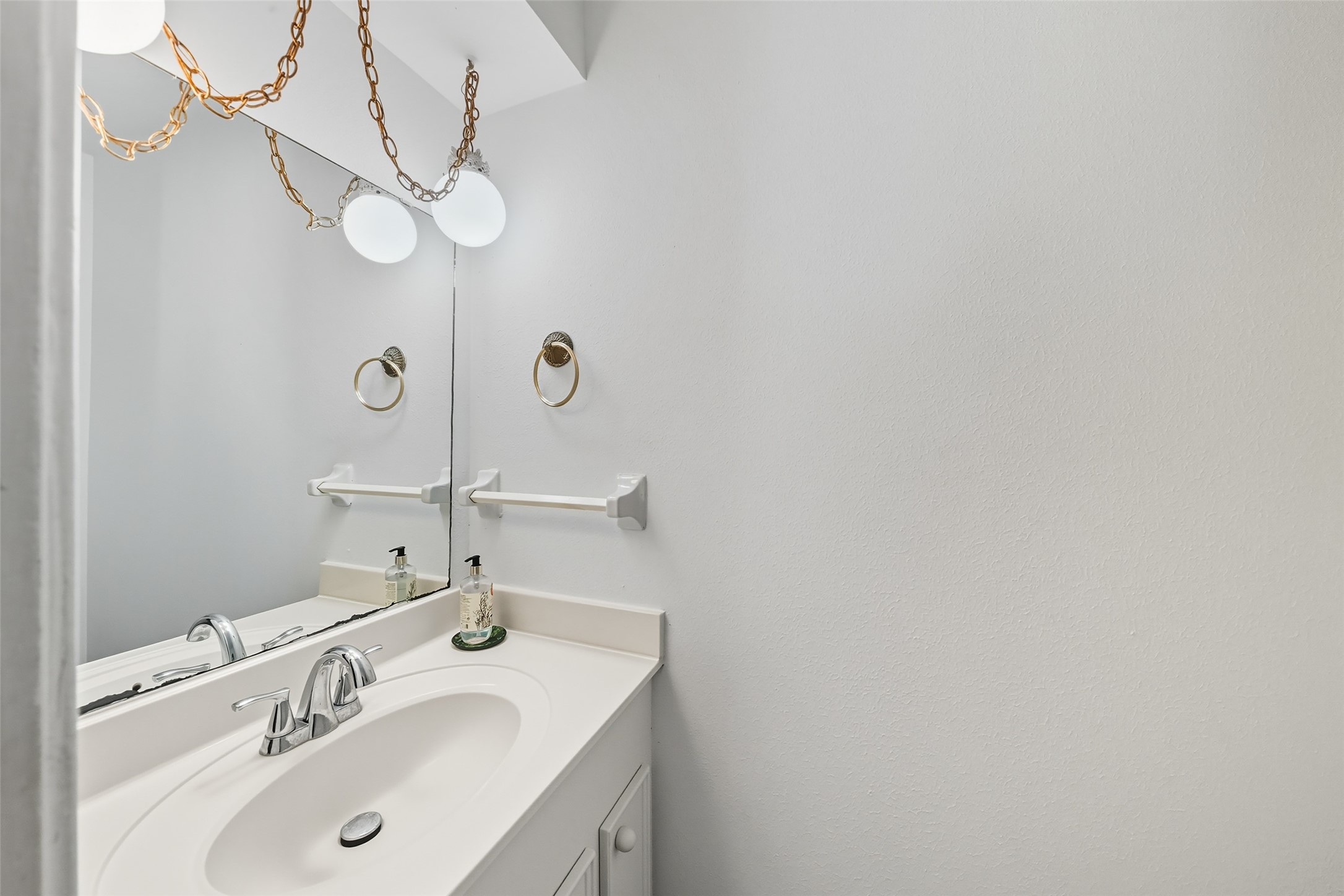 25434 Cedar Lane Splendora, TX 77372 - Photo 25 of 29 a bathroom with a sink and a mirror