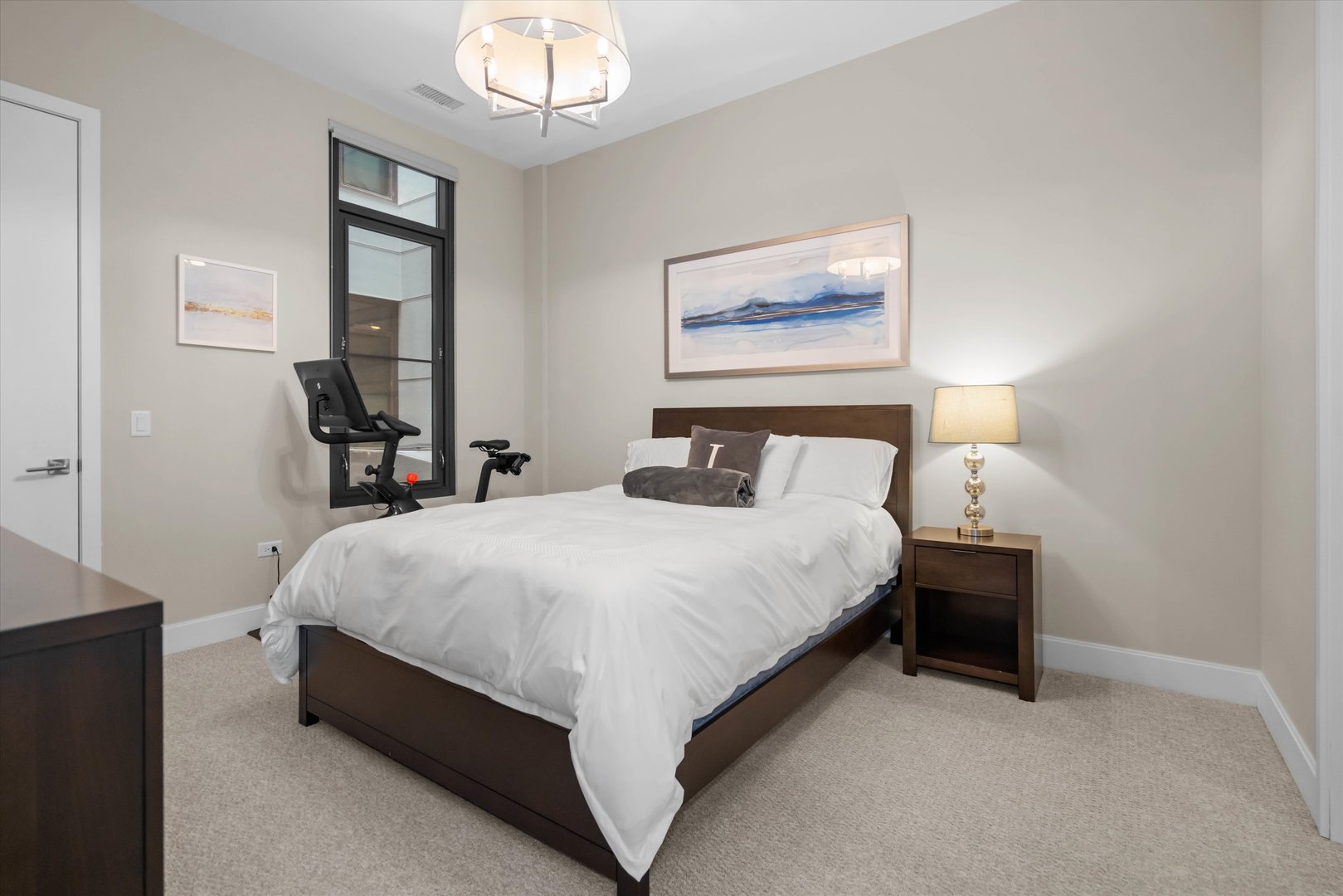 31 North Aberdeen Street, Unit 2S Chicago, IL 60607 - Photo 28 of 33 a bedroom with bed and window