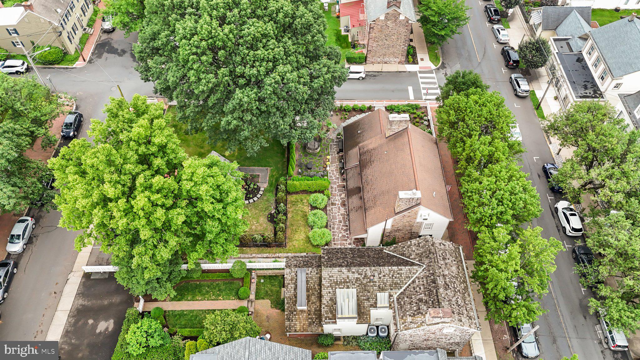 111 South State Street Newtown, PA 18940 - Photo 27 of 37 an aerial view of a house with a yard and garden