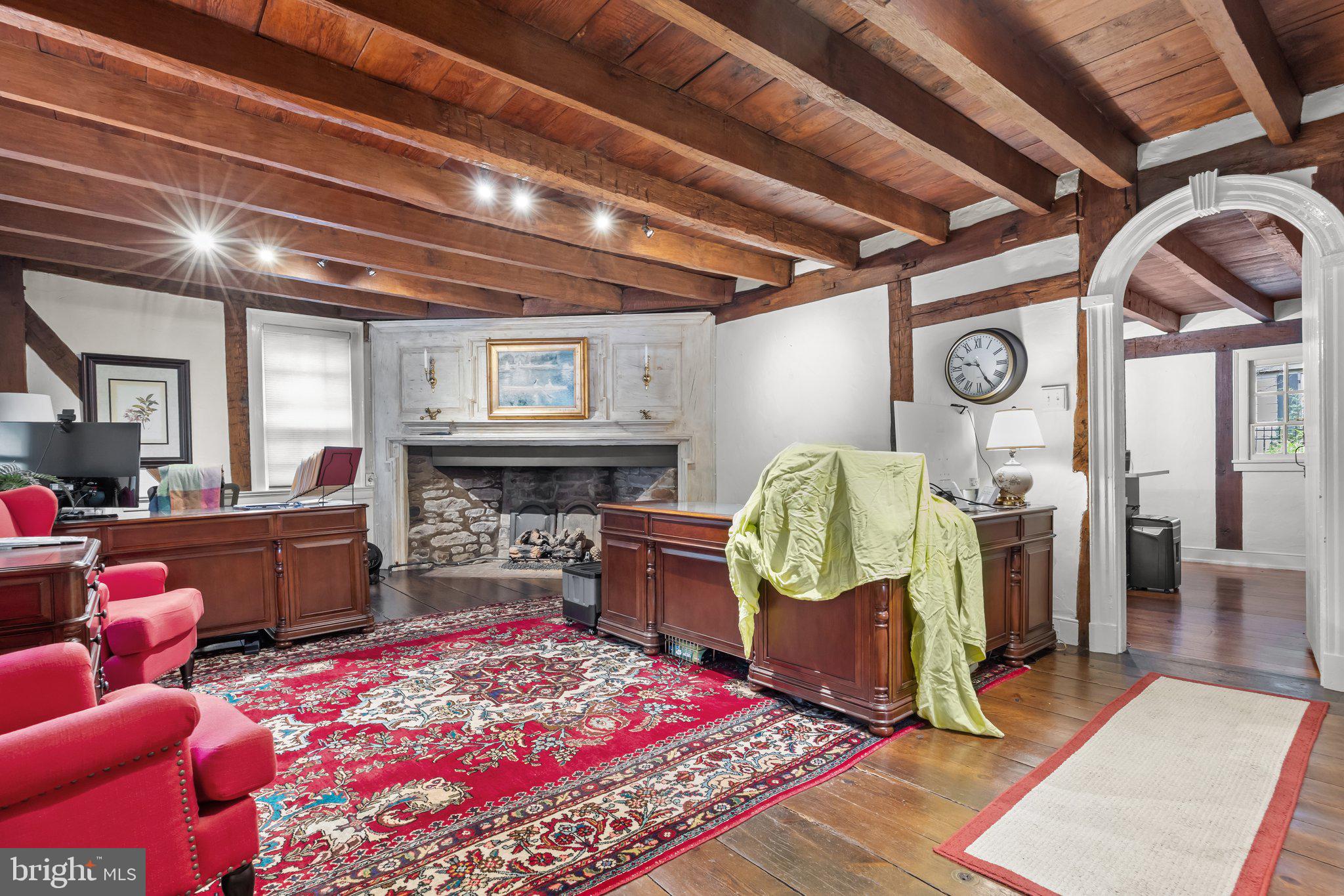 111 South State Street Newtown, PA 18940 - Photo 4 of 37 a living room with furniture and a fireplace