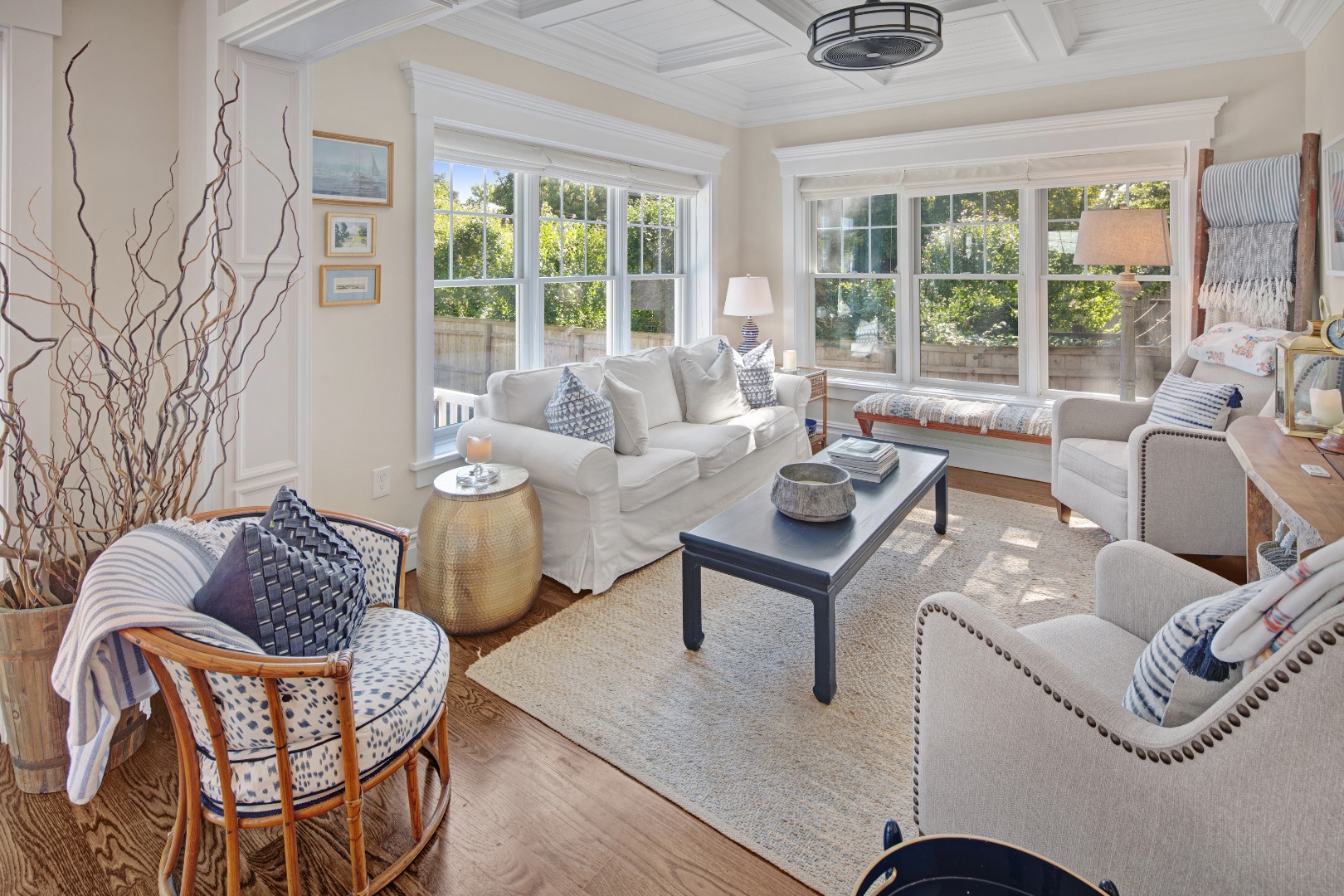 53 Pinehurst Road Edgartown, MA 02539 - Photo 12 of 26 a living room with furniture and a floor to ceiling window