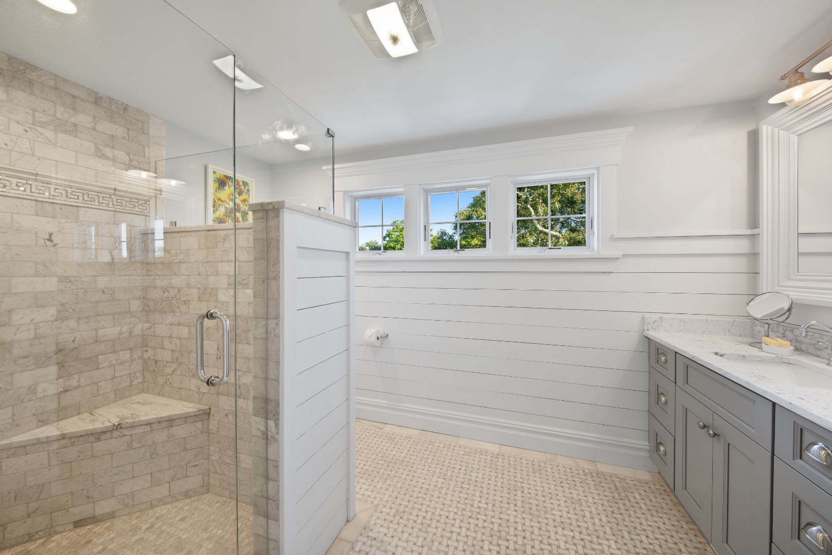 53 Pinehurst Road Edgartown, MA 02539 - Photo 25 of 26 a bathroom with a shower sink and mirror
