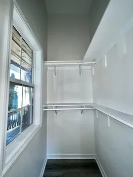 a view of a room with racks on the wall
