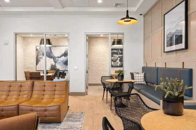 a kitchen with stainless steel appliances granite countertop a refrigerator sink and stove