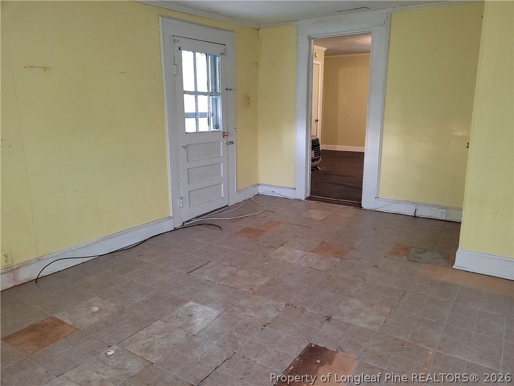 39 Durant Road Wilson's Mills, NC 27527 - Photo 10 of 11 an empty room with windows