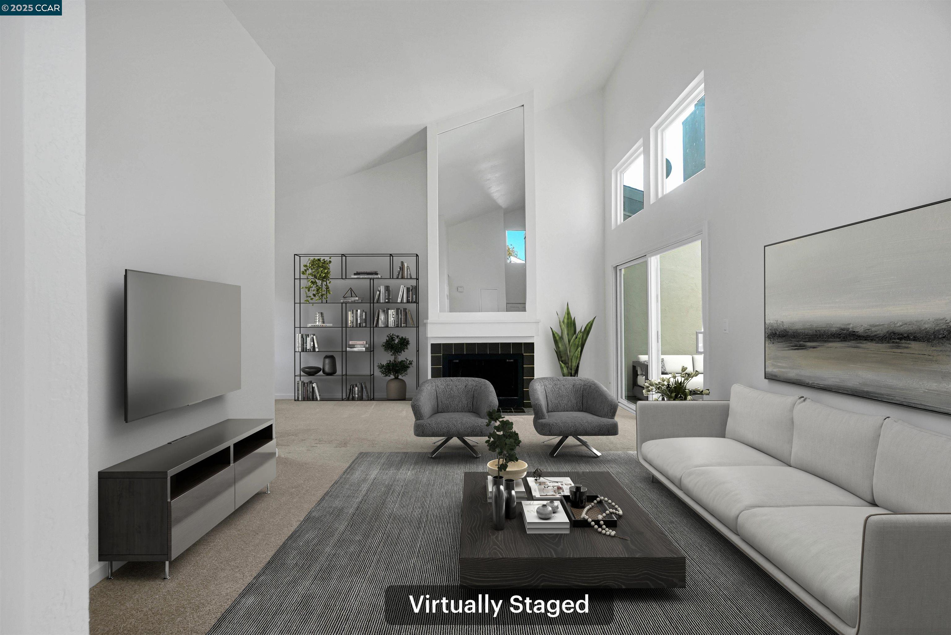 3712 Willow Pass Road, Unit 31 Concord, CA 94519 - Photo 1 of 17 a living room with furniture a fireplace and a flat screen tv