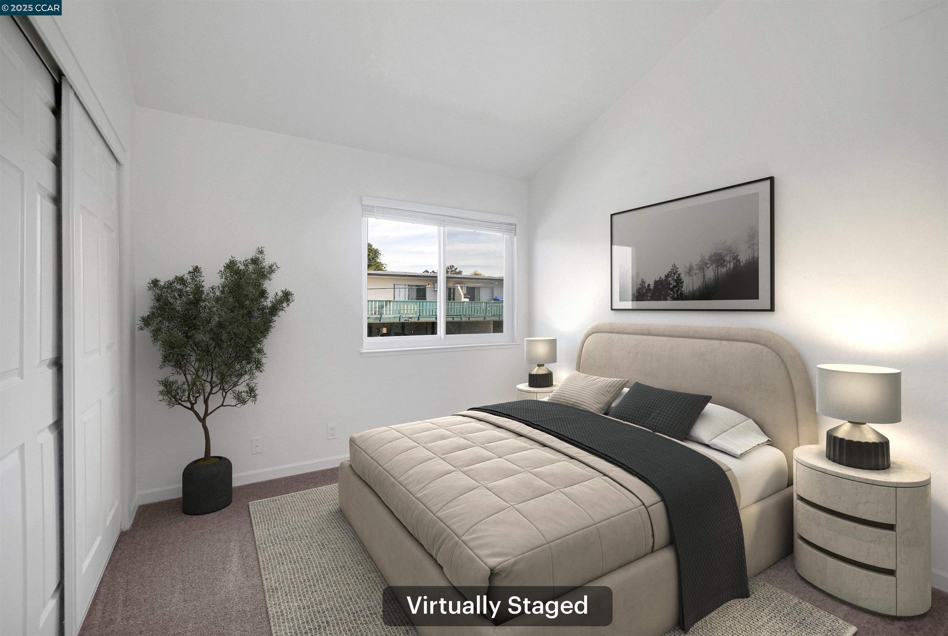 3712 Willow Pass Road, Unit 31 Concord, CA 94519 - Photo 11 of 17 a bedroom with a bed and a window