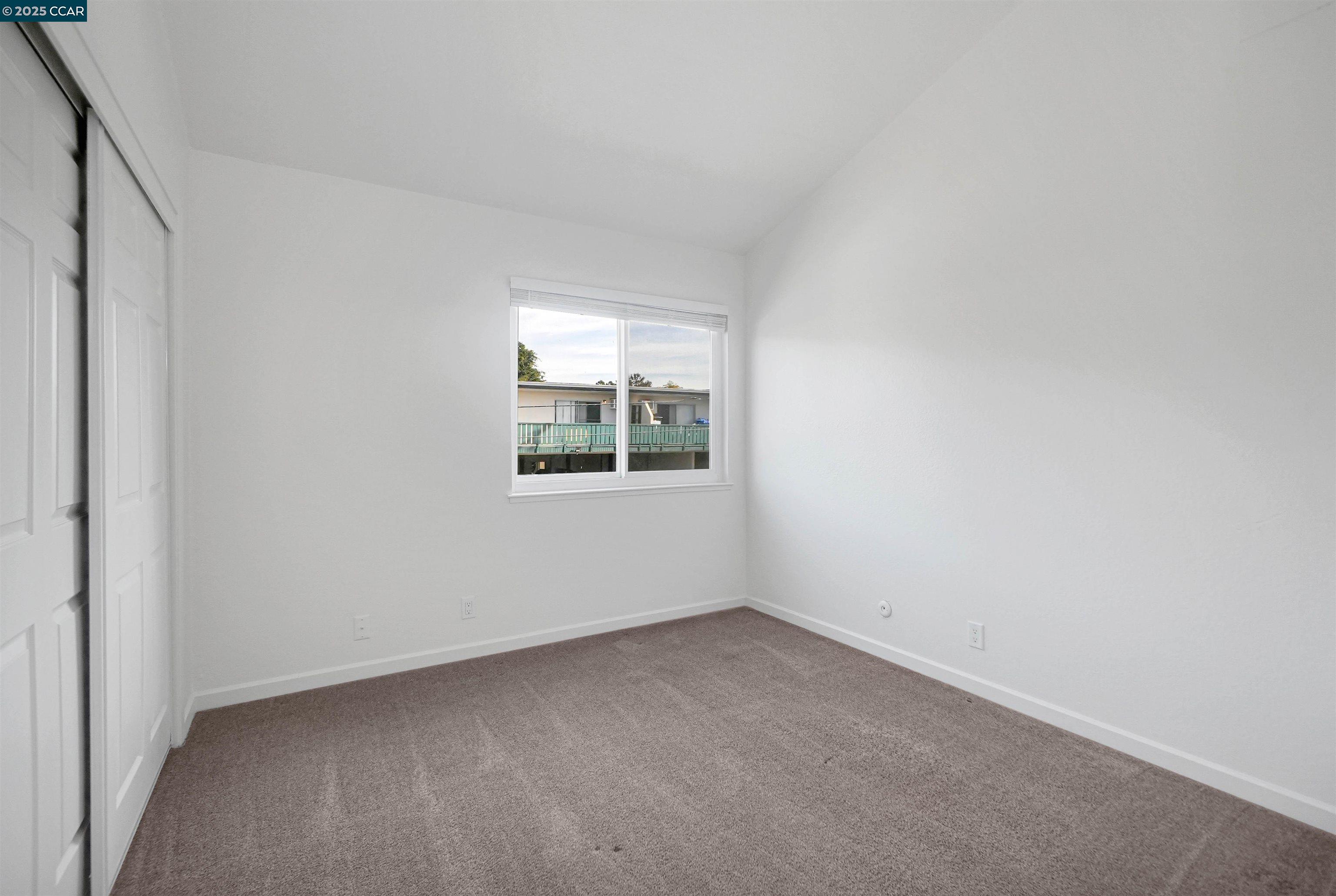 3712 Willow Pass Road, Unit 31 Concord, CA 94519 - Photo 12 of 17 an empty room with a window