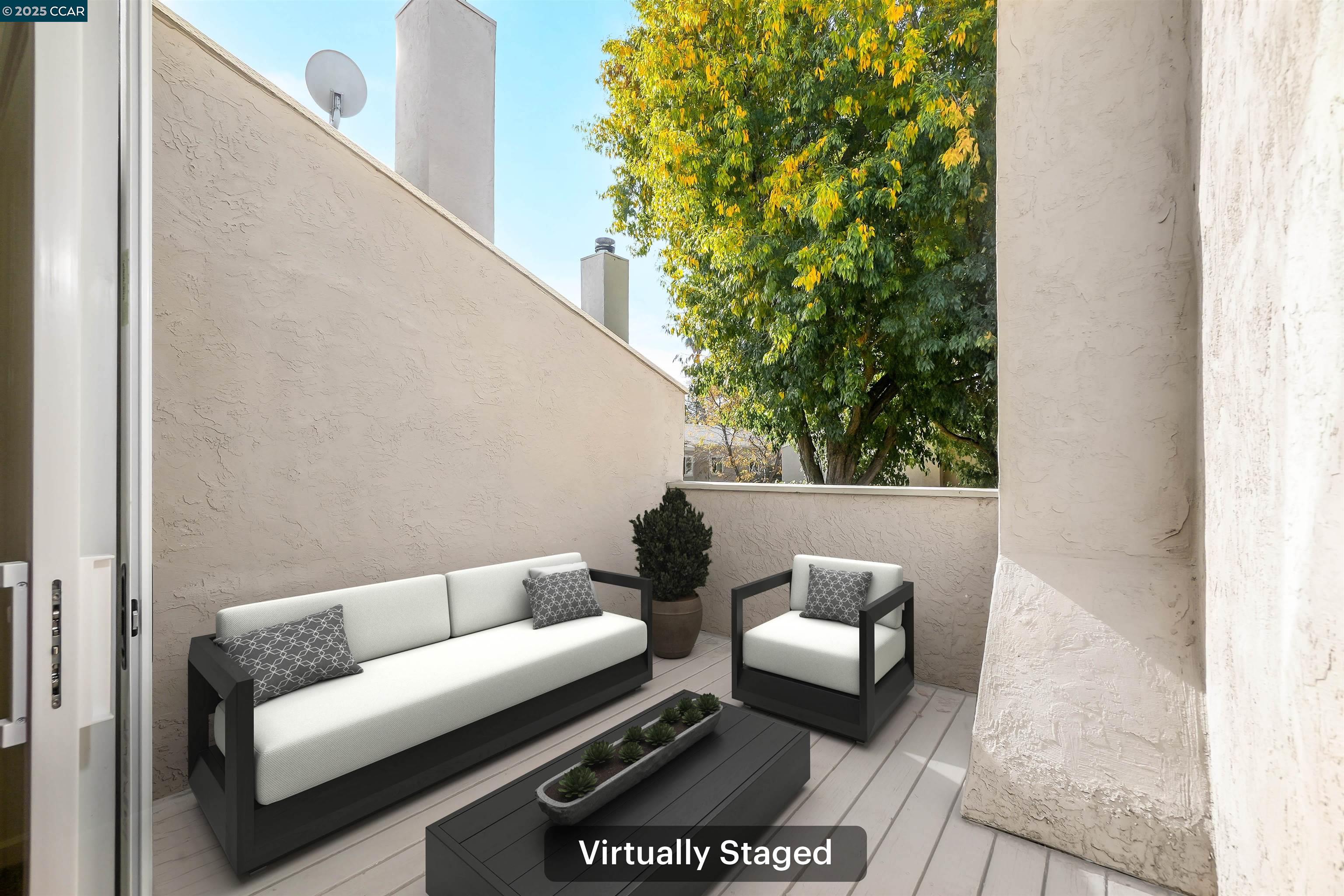 3712 Willow Pass Road, Unit 31 Concord, CA 94519 - Photo 13 of 17 a living room with furniture and a potted plant