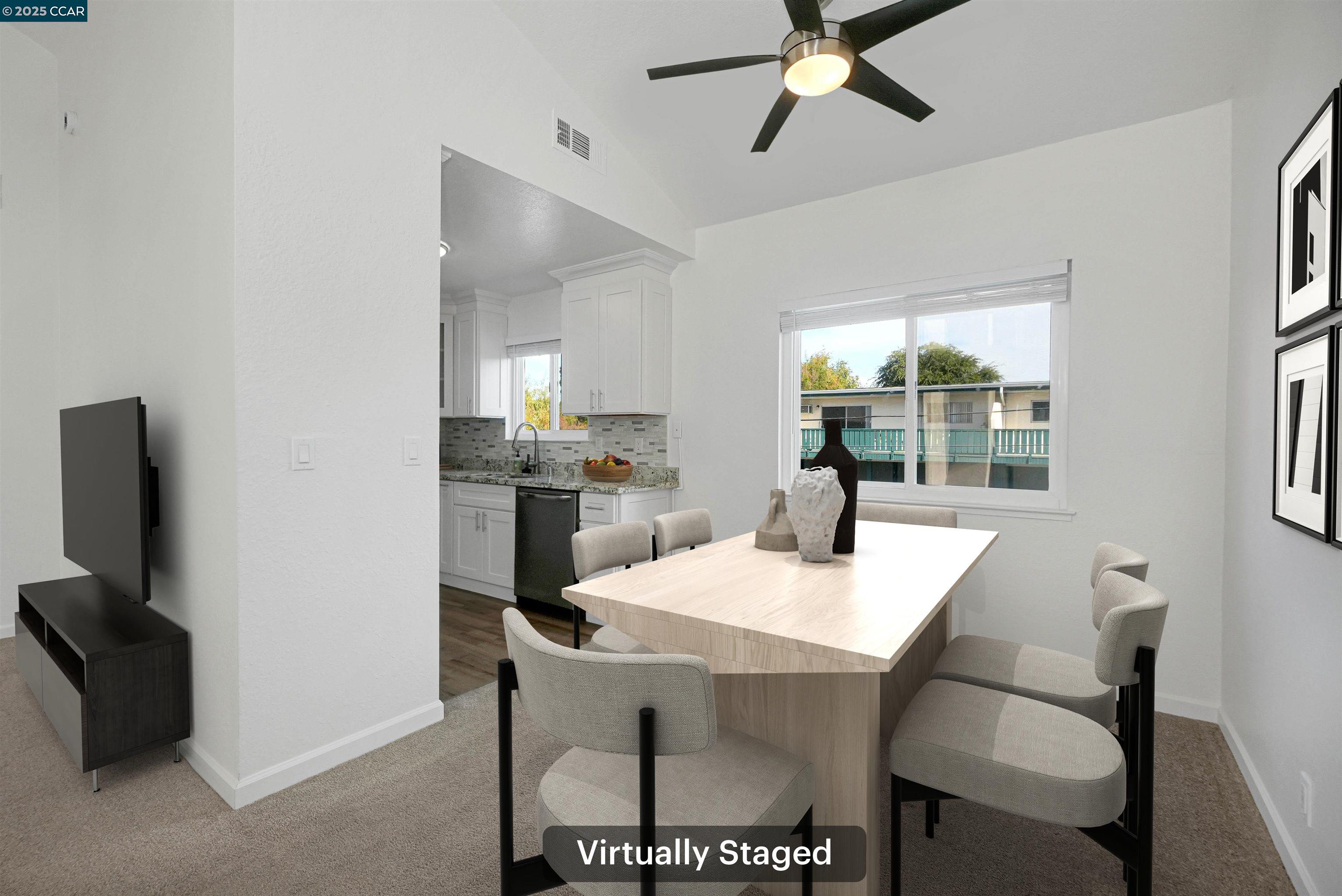 3712 Willow Pass Road, Unit 31 Concord, CA 94519 - Photo 3 of 17 a view of a dining room with furniture and a window