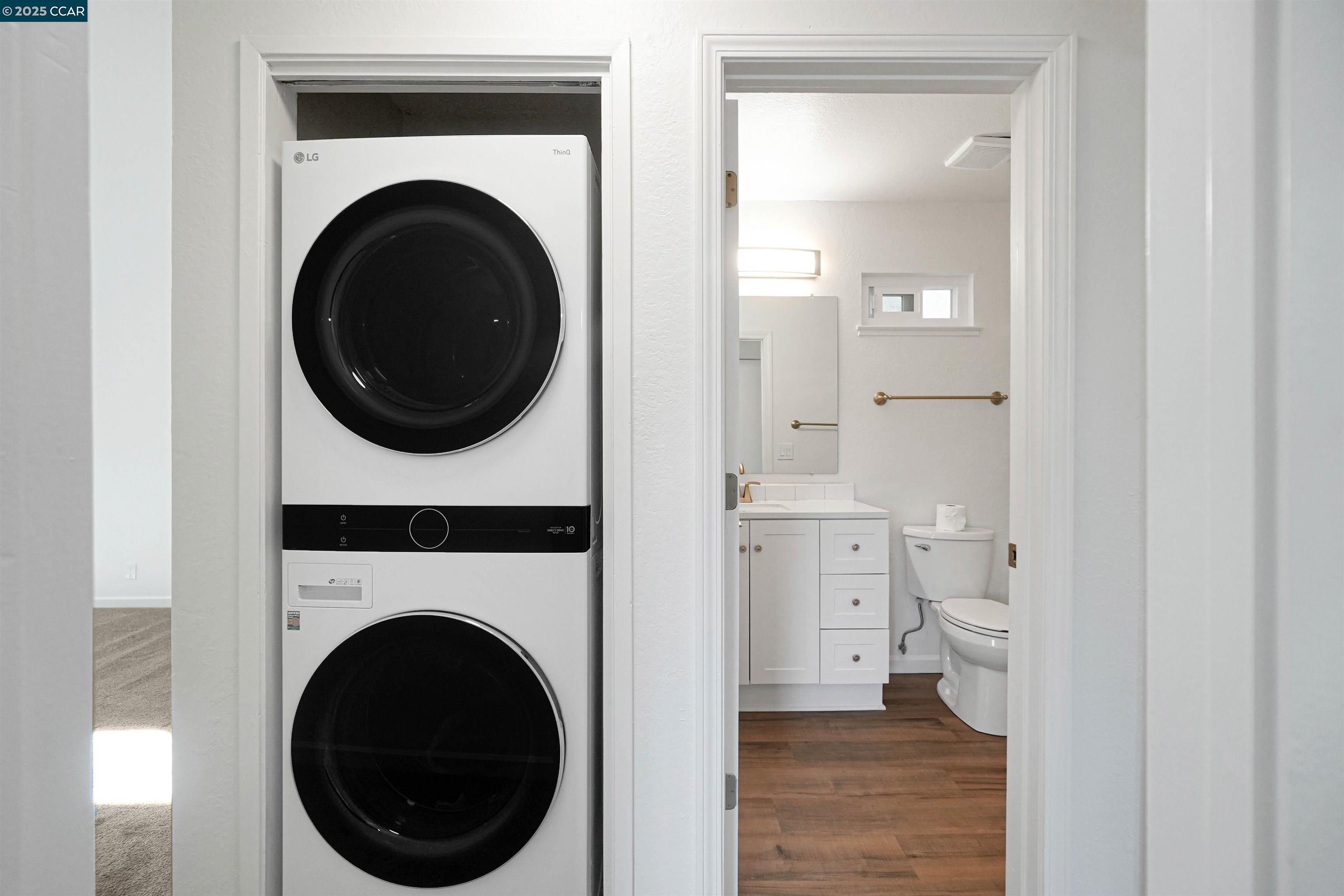 3712 Willow Pass Road, Unit 31 Concord, CA 94519 - Photo 10 of 17 a view of a hallway with washer and dryer