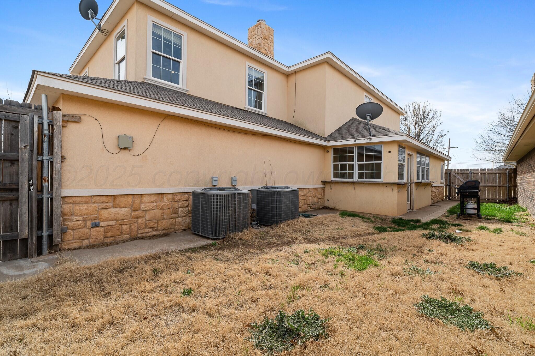6302 Academy Drive Amarillo, TX 79119 - Photo 19 of 19 a view of a house with backyard
