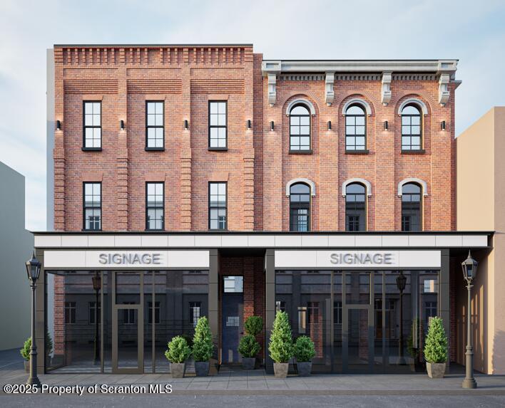 117 Penn Avenue Scranton, PA 18503 - Photo 2 of 25 a front view of building with a garden