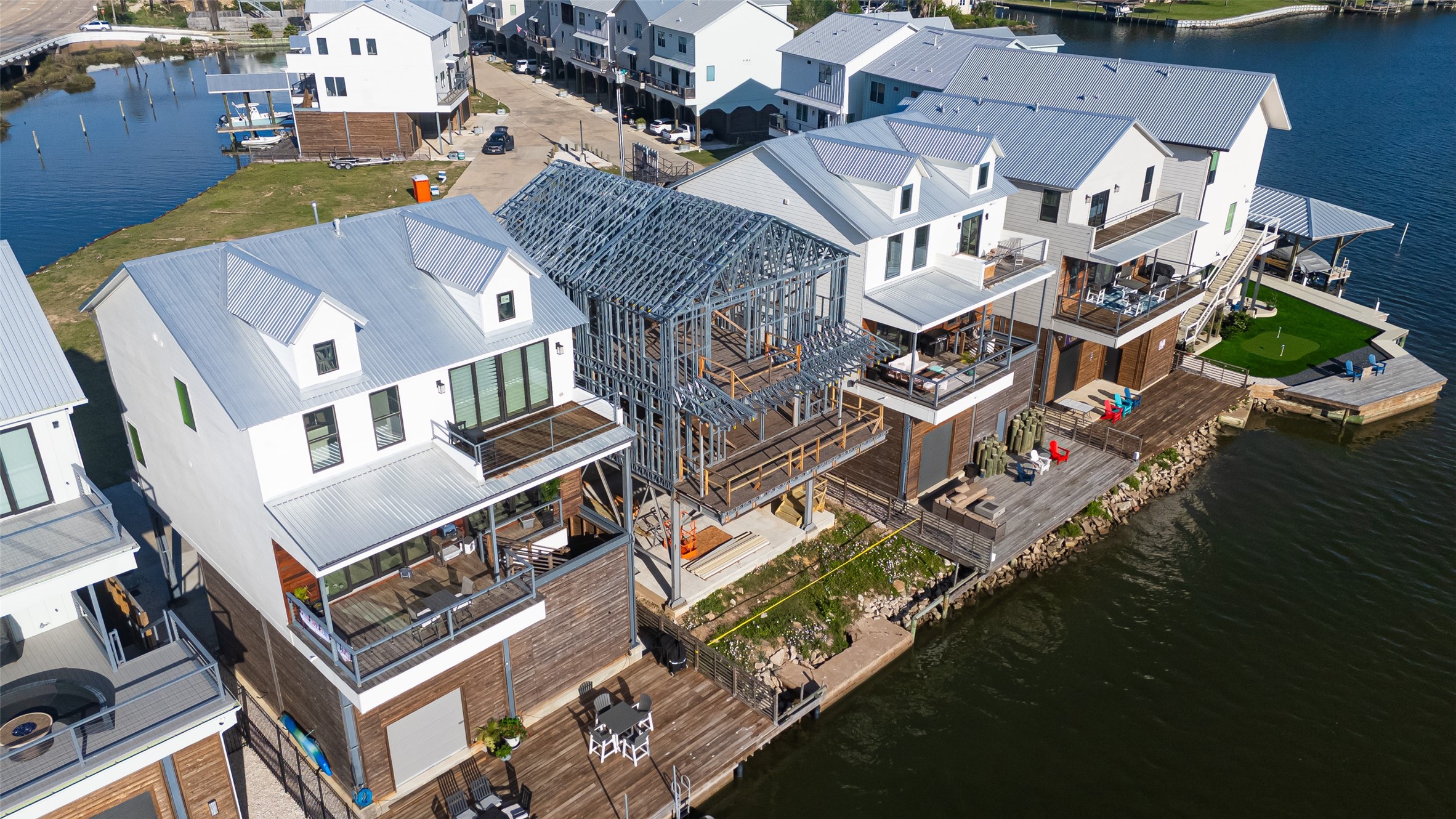 43 Commander Runco Lane Seabrook, TX 77586 - Photo 2 of 32 an aerial view of residential houses with outdoor space