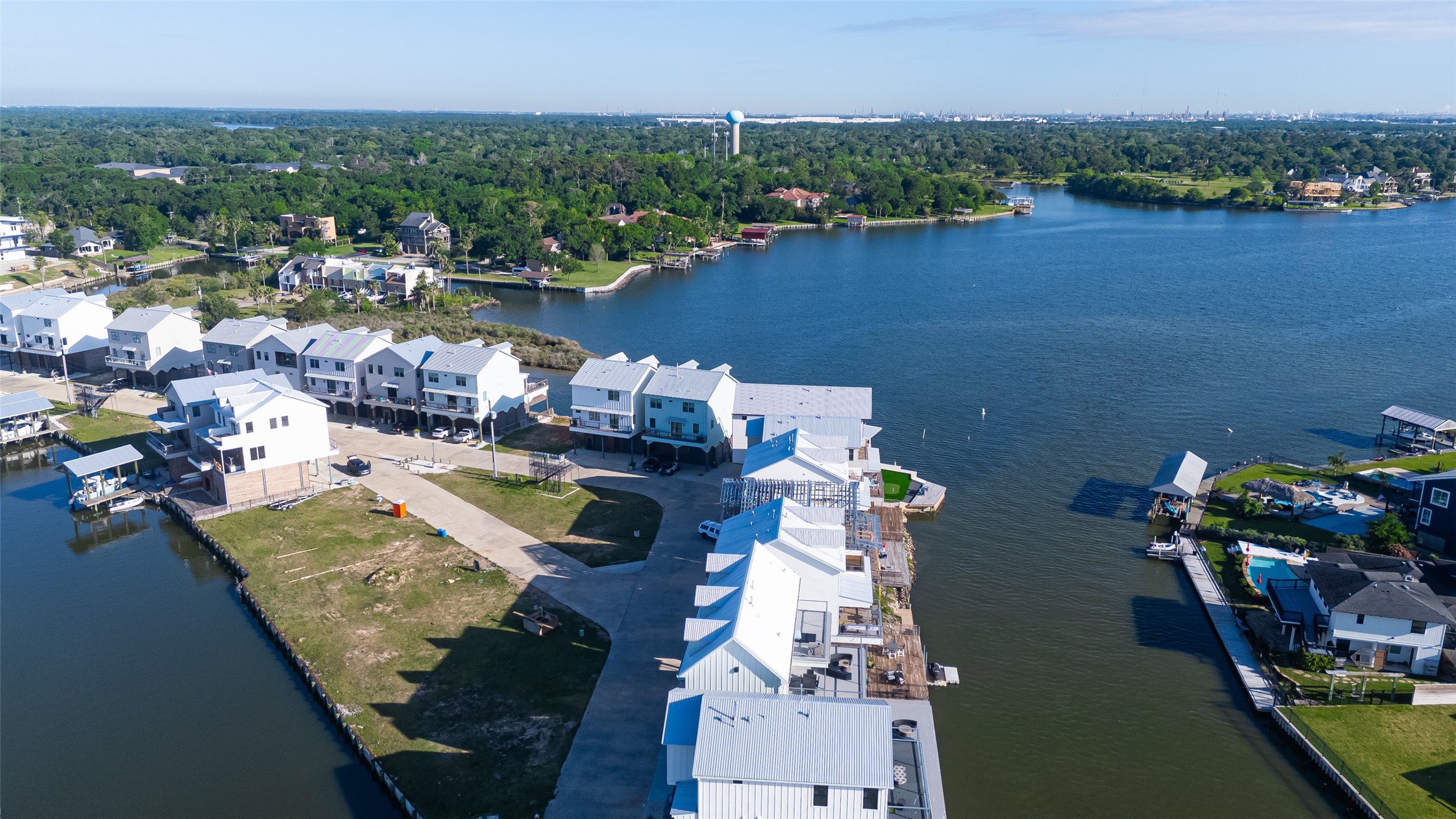 43 Commander Runco Lane Seabrook, TX 77586 - Photo 30 of 32 an aerial view of a house with a lake view