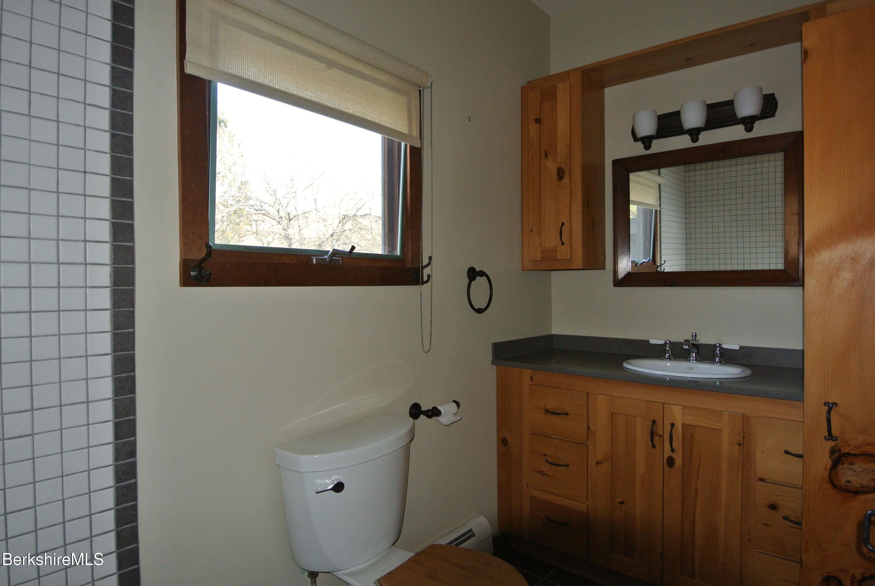 9 Cone Hill Road West Stockbridge, MA 01266 - Photo 18 of 20 a bathroom with a sink a toilet and window
