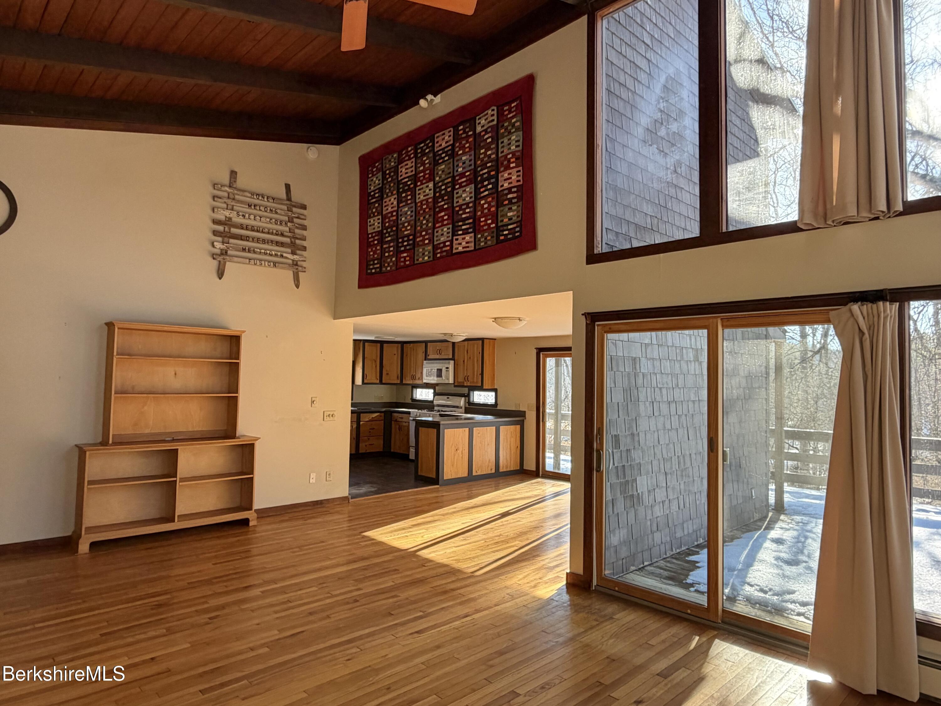 9 Cone Hill Road West Stockbridge, MA 01266 - Photo 9 of 20 a living room with furniture wooden floor and a large window