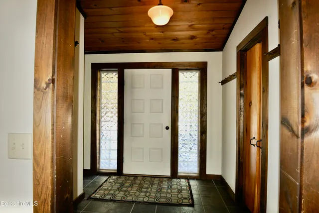 a view of outdoor space and wooden floor