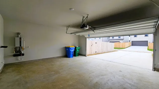 a front view of a house with garage