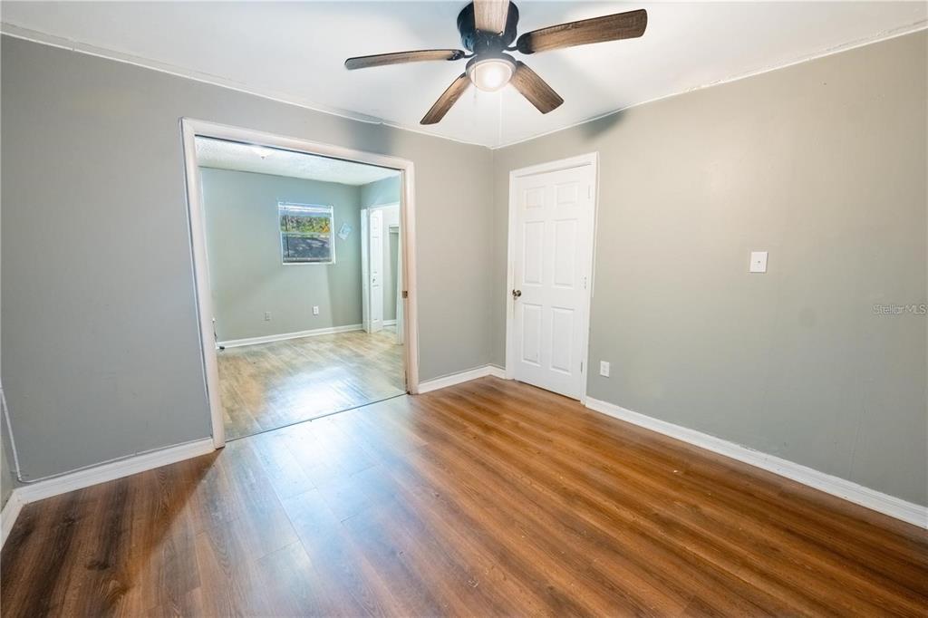 535 West Division Street Deland, FL 32720 - Photo 18 of 25 a view of empty room with wooden floor